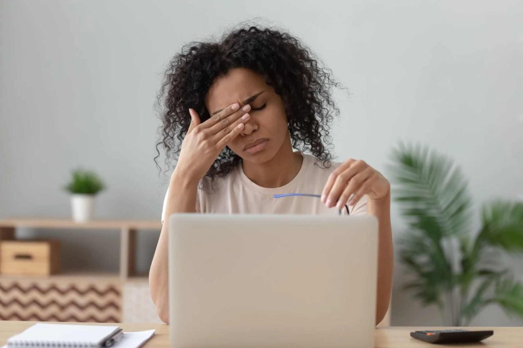 woman at computer with eye strain